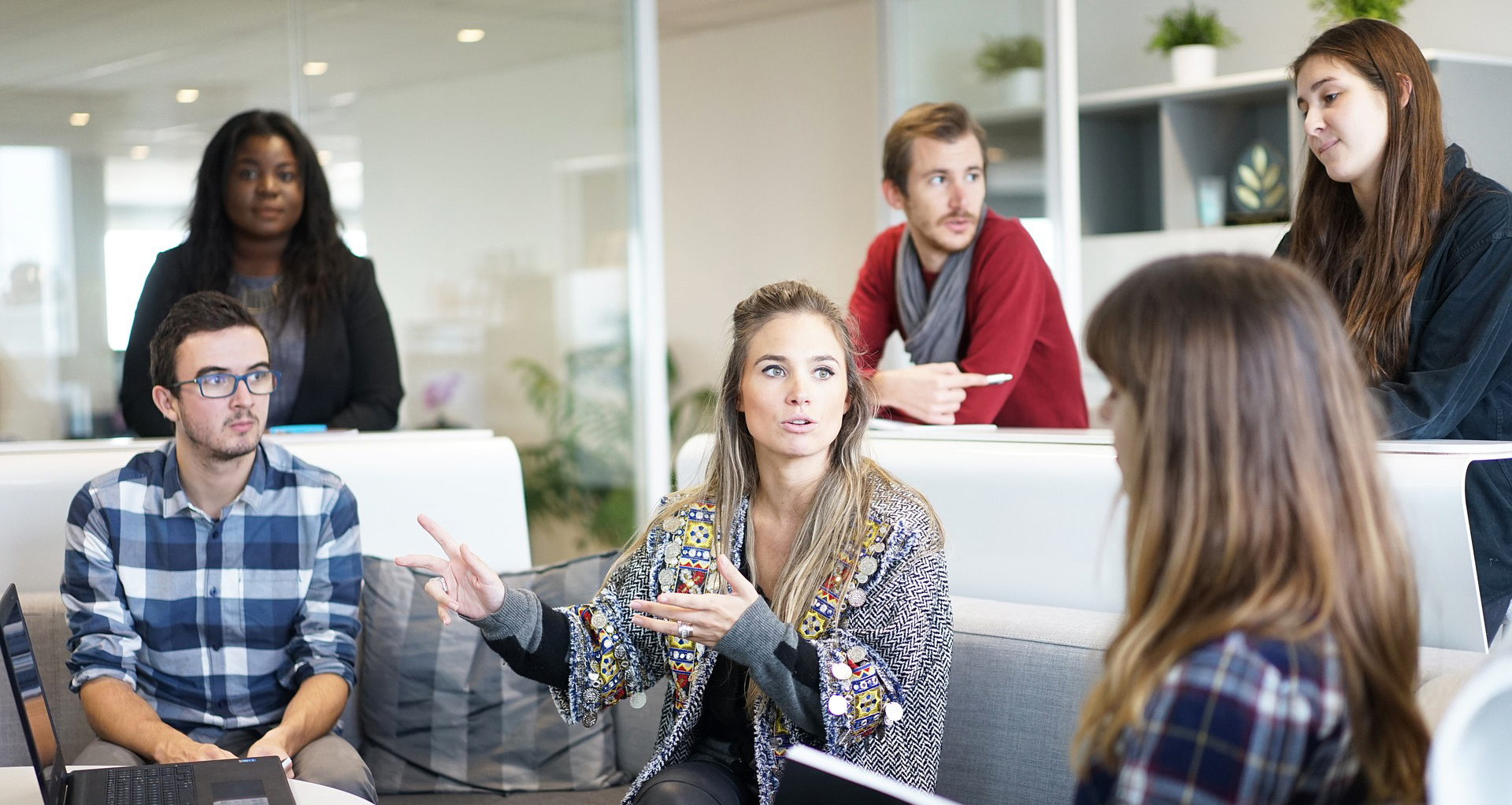Employees sitting around a table working